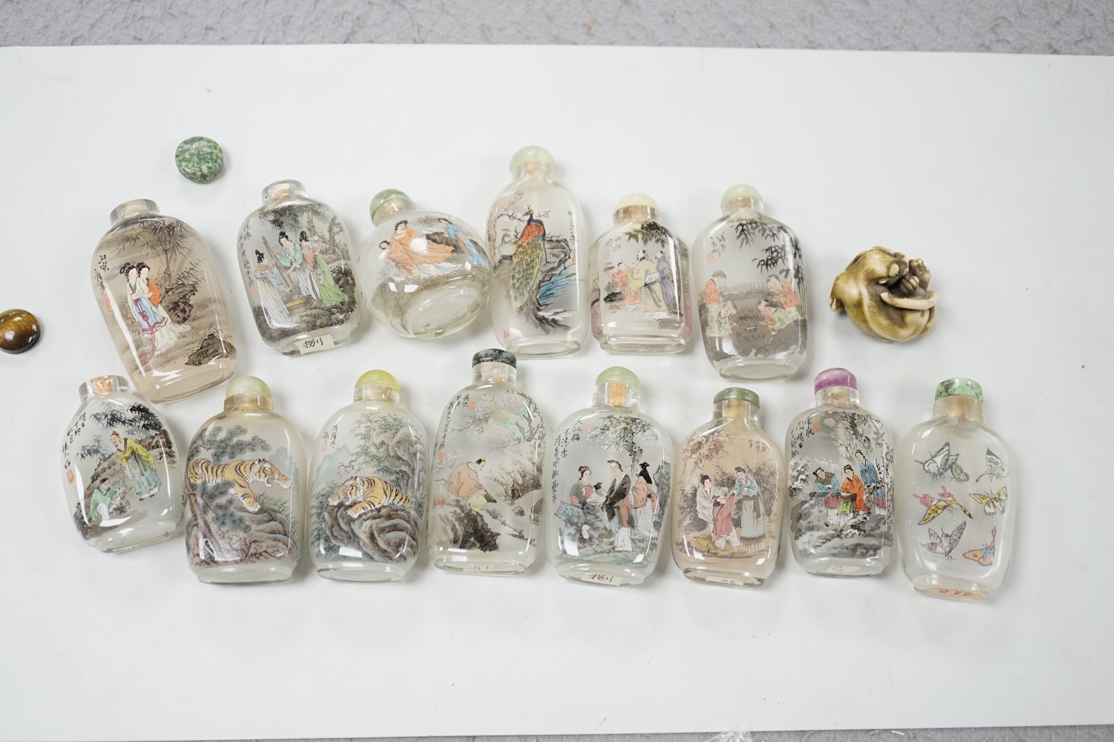 A small collection of Chinese reverse painted bottles